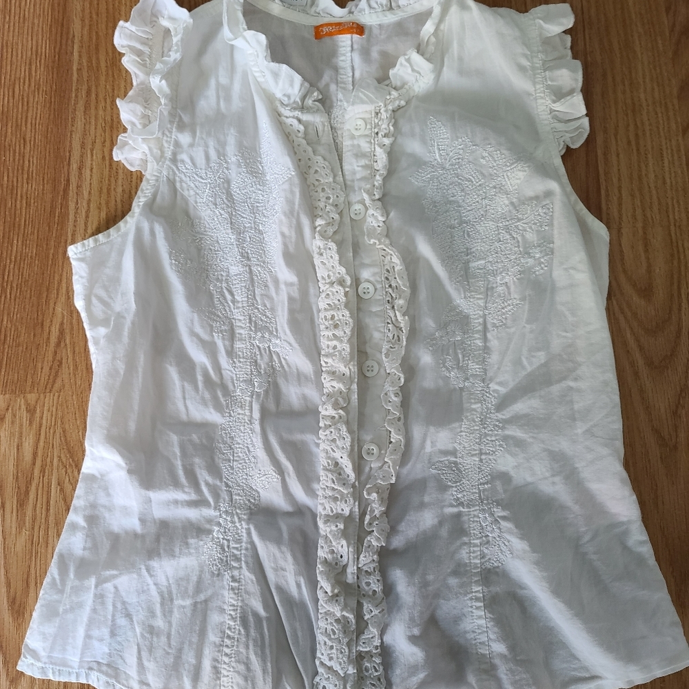 White summer blouse with pretty embroidery.